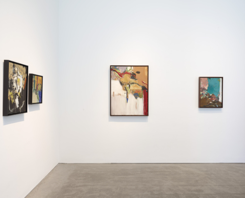 Installation View no. 6 Photo: Roz Akin, Courtesy Berry Campbell, New York Four abstract paintings by Libbie Mark in dark frames are displayed on white gallery walls (corner) at Berry Campbell in New York. The artworks feature bold colors and dynamic compositions.