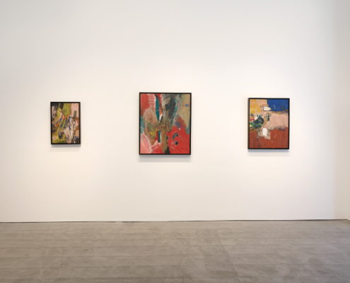 Installation View no. 7 Photo: Roz Akin, Courtesy Berry Campbell, New York Three abstract paintings by Libbie Mark in dark frames are displayed on a white gallery wall at Berry Campbell in New York. The artworks feature bold colors and dynamic compositions.